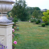 view across terraced lawn to country side
